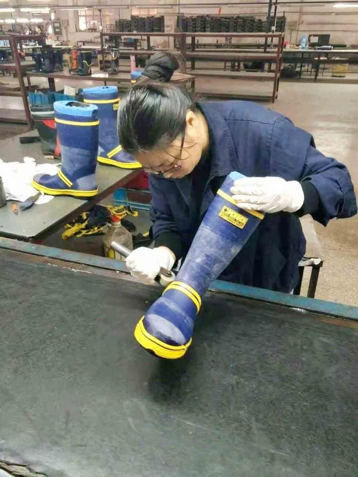 PVC rain boots quality inspection during production