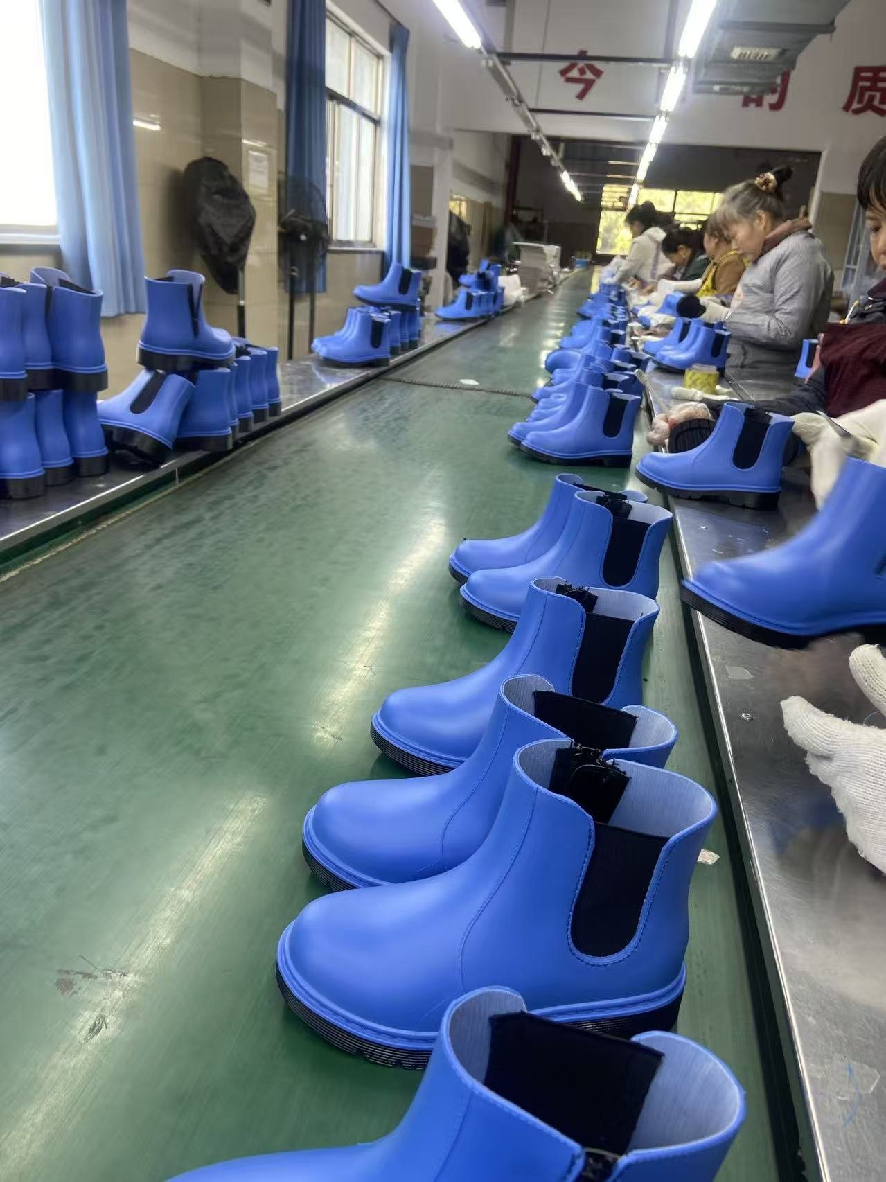 PVC rain boots manufacturing and boot forming production